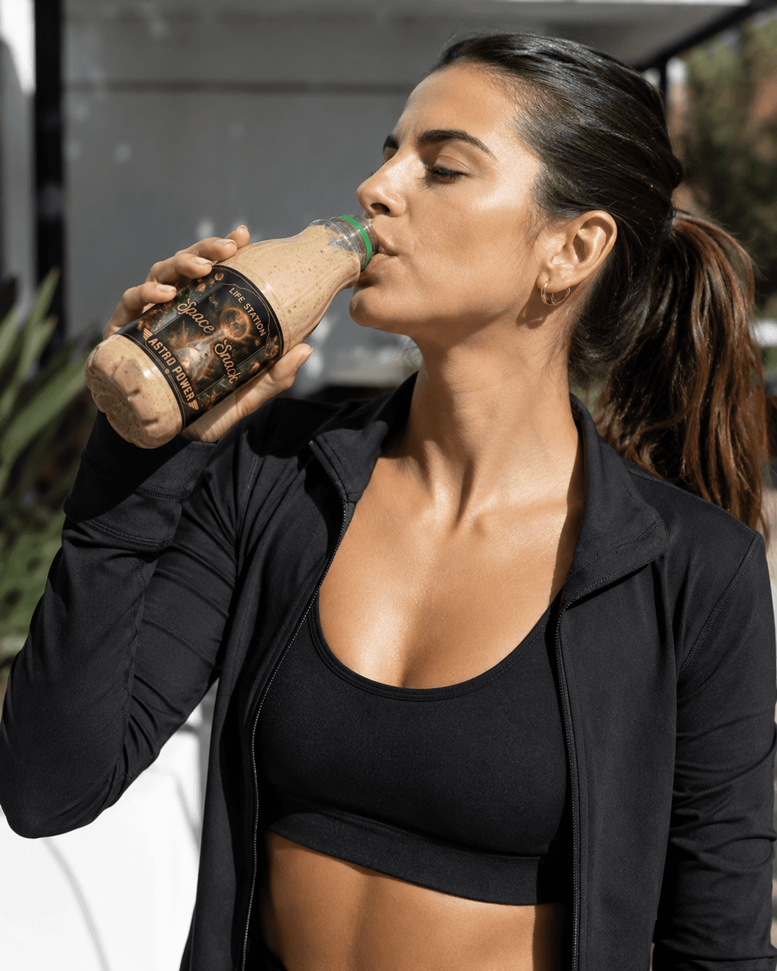 Woman drinking Astro Power